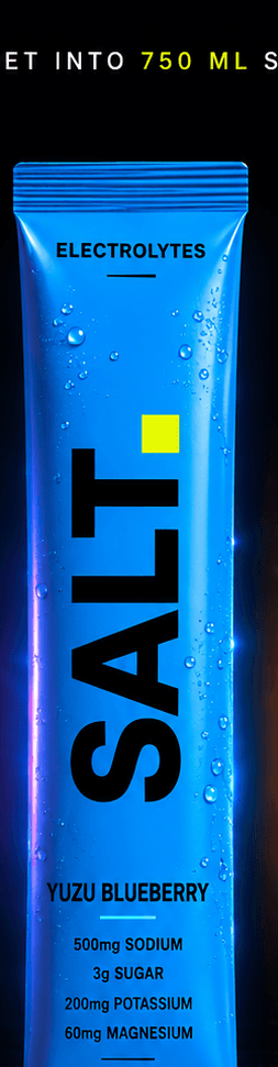 SALT Yuzu Blueberry sachet — vivid blue pack on a dark stage, 500mg sodium, 3g sugar per serve.